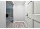 Inviting entryway featuring grey vinyl flooring and freshly painted walls at 2930 Parc Lorraine, Lithonia, GA 30038