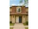 Charming home featuring unique double doors, sconce lighting, and a classic window accent at 2930 Parc Lorraine, Lithonia, GA 30038