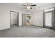 Comfortable bedroom with carpet, closet, balcony and access to an en-suite bathroom at 390 17Th Nw St # 5008, Atlanta, GA 30363