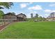 Spacious backyard featuring a screened in porch and a large grassy area at 2272 Plantation Ct, Lawrenceville, GA 30044