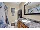 Well-lit bathroom featuring a vanity with dark countertop and a corgi shower curtain at 2272 Plantation Ct, Lawrenceville, GA 30044