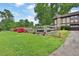 Exterior view of a home showing the driveway and garden area at 2272 Plantation Ct, Lawrenceville, GA 30044