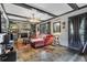 Inviting living room with fireplace, built-in shelves, and access to the backyard at 2272 Plantation Ct, Lawrenceville, GA 30044