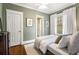 Serene bedroom with hardwood floors, white trim, neutral color palette, and ample natural light at 509 Rankin Ne St, Atlanta, GA 30308