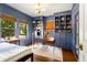 Stylish bedroom with bright light, custom built-in shelving, hardwood floors, and designer touches at 509 Rankin Ne St, Atlanta, GA 30308