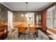 Bright dining room offering hardwood floors, stylish decor, and seamless access to other rooms at 509 Rankin Ne St, Atlanta, GA 30308