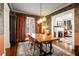 Cozy dining room showcasing hardwood floors, stylish lighting, and access to other living areas at 509 Rankin Ne St, Atlanta, GA 30308