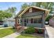 Charming home with a screened-in porch and well-manicured front yard at 509 Rankin Ne St, Atlanta, GA 30308