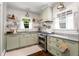 Charming kitchen with granite countertops, ample cabinet space, stainless steel appliances, and lots of light at 509 Rankin Ne St, Atlanta, GA 30308