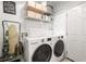 Functional laundry room with modern appliances, storage shelving, and a clean, organized layout at 509 Rankin Ne St, Atlanta, GA 30308