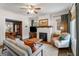 Inviting living room featuring hardwood floors, a fireplace, and comfortable seating at 509 Rankin Ne St, Atlanta, GA 30308