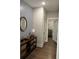 Stylish entryway featuring patterned wallpaper, console table, and decorative accents at 186 Sunshower Rdg, Canton, GA 30114