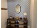 Stylish entryway featuring patterned wallpaper, console table, and decorative accents at 186 Sunshower Rdg, Canton, GA 30114