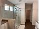 Sleek main bathroom with a glass shower, a seat, and a modern vanity adds luxury to your daily routine at 186 Sunshower Rdg, Canton, GA 30114