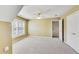 Bedroom featuring neutral carpet and a window with blinds at 2119 Wrights Mill Ne Cir, Atlanta, GA 30324