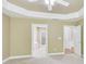 The Primary bedroom boasts trey ceilings, an ensuite bathroom, and two walk-in closets at 2119 Wrights Mill Ne Cir, Atlanta, GA 30324