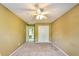 Bedroom with neutral carpet, closet, and ensuite bathroom at 2119 Wrights Mill Ne Cir, Atlanta, GA 30324