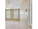 Bedroom featuring neutral carpet and a window with blinds at 2119 Wrights Mill Ne Cir, Atlanta, GA 30324