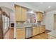 Modern kitchen featuring stainless steel appliances, granite countertops and hardwood floors at 2119 Wrights Mill Ne Cir, Atlanta, GA 30324