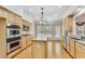 Spacious kitchen with an island, stainless steel appliances, and hardwood floors at 2119 Wrights Mill Ne Cir, Atlanta, GA 30324