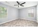 Bright bedroom with hardwood floors, ceiling fan, and natural light at 248 Upshaw Sw St, Atlanta, GA 30315