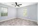 Spacious bedroom featuring new flooring and a modern ceiling fan at 248 Upshaw Sw St, Atlanta, GA 30315