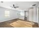 Open-concept living room with modern lighting, flooring, and ample natural light at 248 Upshaw Sw St, Atlanta, GA 30315