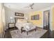 Inviting bedroom with plush carpeting, decorative lamps, and elegant furniture at 289 Heritage Se Ln, Atlanta, GA 30316
