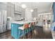 Bright kitchen with stainless steel appliances, an island with seating, and modern fixtures at 289 Heritage Se Ln, Atlanta, GA 30316