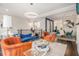 Bright living room boasts modern lighting, hardwood floors, and open floor plan at 289 Heritage Se Ln, Atlanta, GA 30316