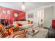 Cozy living room with an accent wall, plush rug, and stylish modern furniture at 289 Heritage Se Ln, Atlanta, GA 30316