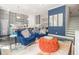 Open concept living area with kitchen access, stylish furniture, and hardwood flooring at 289 Heritage Se Ln, Atlanta, GA 30316