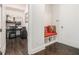 Hallway featuring a charming mudroom nook and a view into an office area at 289 Heritage Se Ln, Atlanta, GA 30316