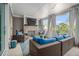 Covered outdoor patio featuring comfortable seating, a fireplace, and scenic views at 289 Heritage Se Ln, Atlanta, GA 30316