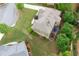 Aerial view of a home with a spacious yard, deck, and meticulously maintained landscaping at 3309 Nw Past Nw Pl, Kennesaw, GA 30152
