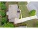 An aerial view of a house featuring a well-manicured lawn, and a spacious driveway at 3309 Nw Past Nw Pl, Kennesaw, GA 30152