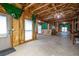 Unfinished basement with concrete floor, windows and door to outside at 3309 Nw Past Nw Pl, Kennesaw, GA 30152