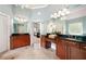 Primary bathroom with separate vanities and granite counters, offering style and functionality at 3309 Nw Past Nw Pl, Kennesaw, GA 30152