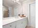 Bathroom featuring a double sink vanity with white countertops and ample storage below at 3309 Nw Past Nw Pl, Kennesaw, GA 30152