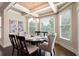 Elegant dining area with a large bay window and modern chandelier at 3309 Nw Past Nw Pl, Kennesaw, GA 30152