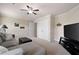 Media room with large TV, comfortable seating, and theater decor is perfect for entertaining guests at 3309 Nw Past Nw Pl, Kennesaw, GA 30152