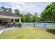 Community tennis courts and covered picnic area with lush greenery and lawn at 3309 Nw Past Nw Pl, Kennesaw, GA 30152