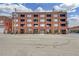 Brick exterior of building with multiple floors and large windows and street view at 346 Peters Sw St # 207, Atlanta, GA 30313