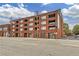 Exterior of brick building featuring balconies and large windows, street view at 346 Peters Sw St # 207, Atlanta, GA 30313