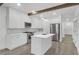 Modern kitchen with stainless steel appliances, white cabinets, and concrete floors at 346 Peters Sw St # 207, Atlanta, GA 30313