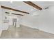 Open concept living space with exposed beams and stainless steel kitchen appliances at 346 Peters Sw St # 207, Atlanta, GA 30313