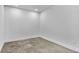 A well-lit, empty room with concrete floors ready for customization and personalization at 346 Peters Sw St # 207, Atlanta, GA 30313