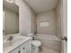 Modern bathroom featuring a tub and shower combo with white vanity at 3681 Auger Trl, Douglasville, GA 30135