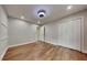 This bedroom includes hardwood floors, a ceiling fan, and a large closet at 3681 Auger Trl, Douglasville, GA 30135