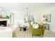 Inviting living room with fireplace, stylish furnishings, and seamless transition into the modern kitchen at 1662 Rainier Falls Ne Dr, Atlanta, GA 30329